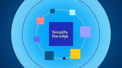 A graphic featuring a centered dark blue square and white text that reads “simply the edge,” which sits inside light blue concentric circles