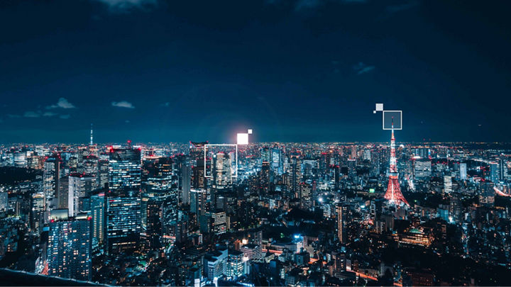 A bird’s-eye view of a cityscape at night