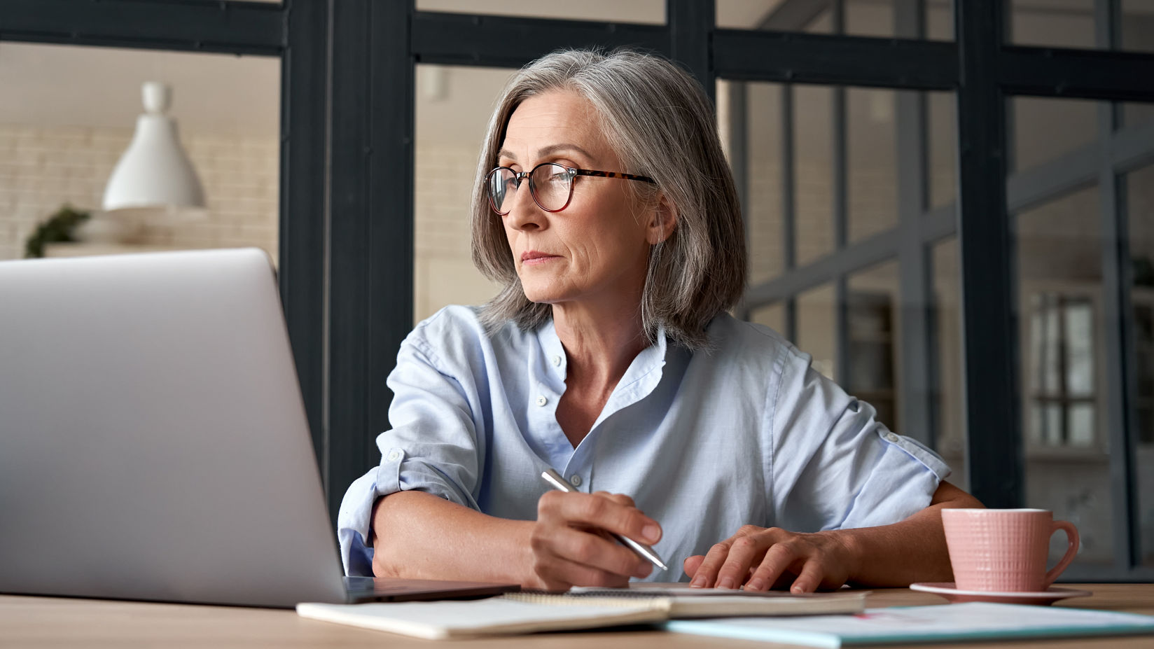 Business woman watching training webinar
