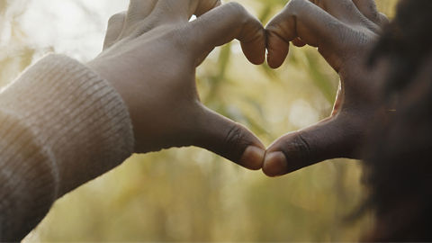 Photo of hands making a heart