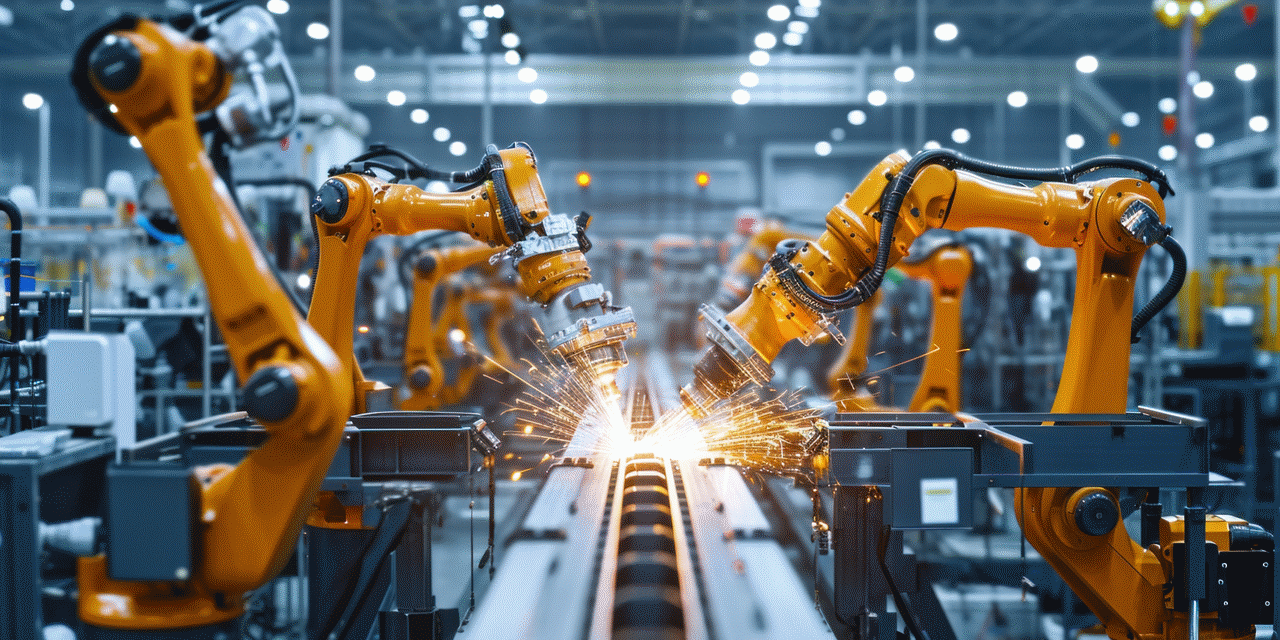 Industrial welding hand robots in manufacturing production line