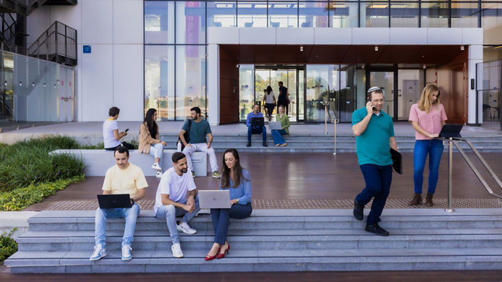 Groups of Israel employees with laptops