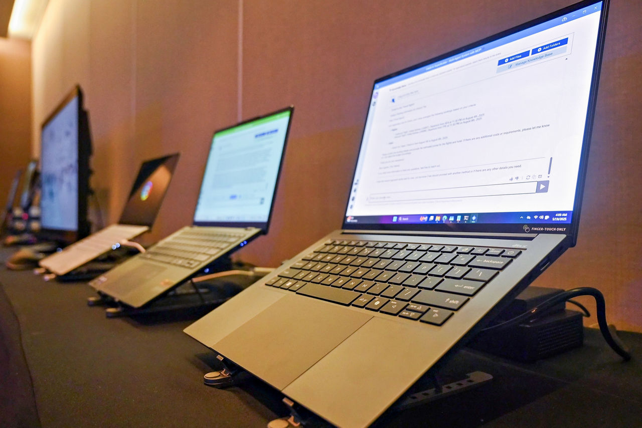 Intel displays AI PCs with Intel Core Ultra processors running Intel AI Assistant Builder at Computex 2025 in Taipei, Taiwan. On May 19, 2025, Intel announced that AI Assistant Builder is now available in public beta at GitHub. (Credit: Intel Corporation)