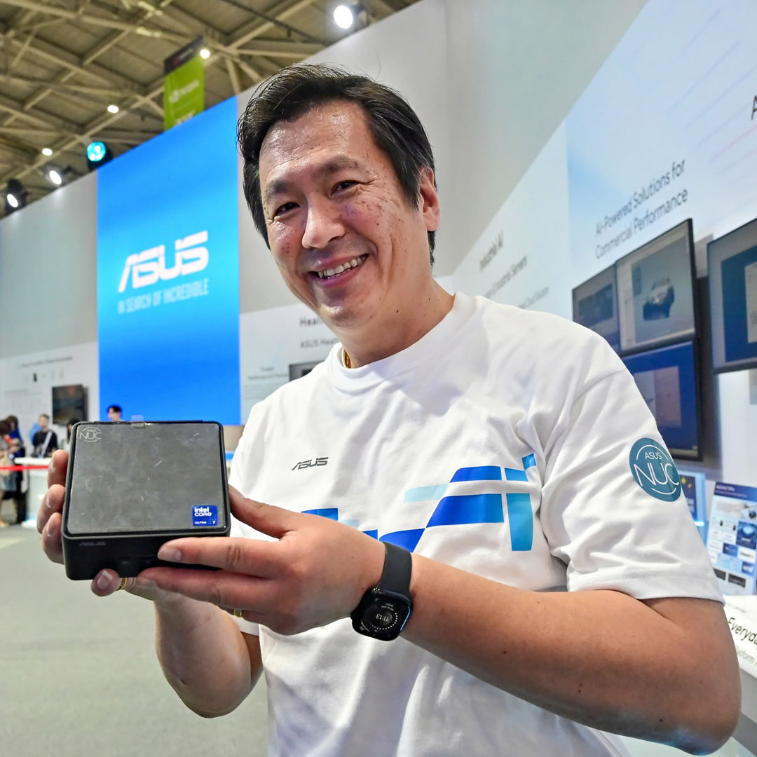 At Computex in Taipei, Taiwan, on Tuesday, May 20, 2025, Arthur Chang, product line manager in the ASUS IoT and NUC Business Unit for ASUS, displays the ASUS NUC 15 Pro, which features the latest Intel Core Ultra (Series 2) processor and launches in the second half of 2025. At Computex 2025, ASUS announced a collaboration with Intel on a new AI developer tool kit – ASUS AI Superbuild – to streamline the development of AI applications. (Credit: Intel Corporation)