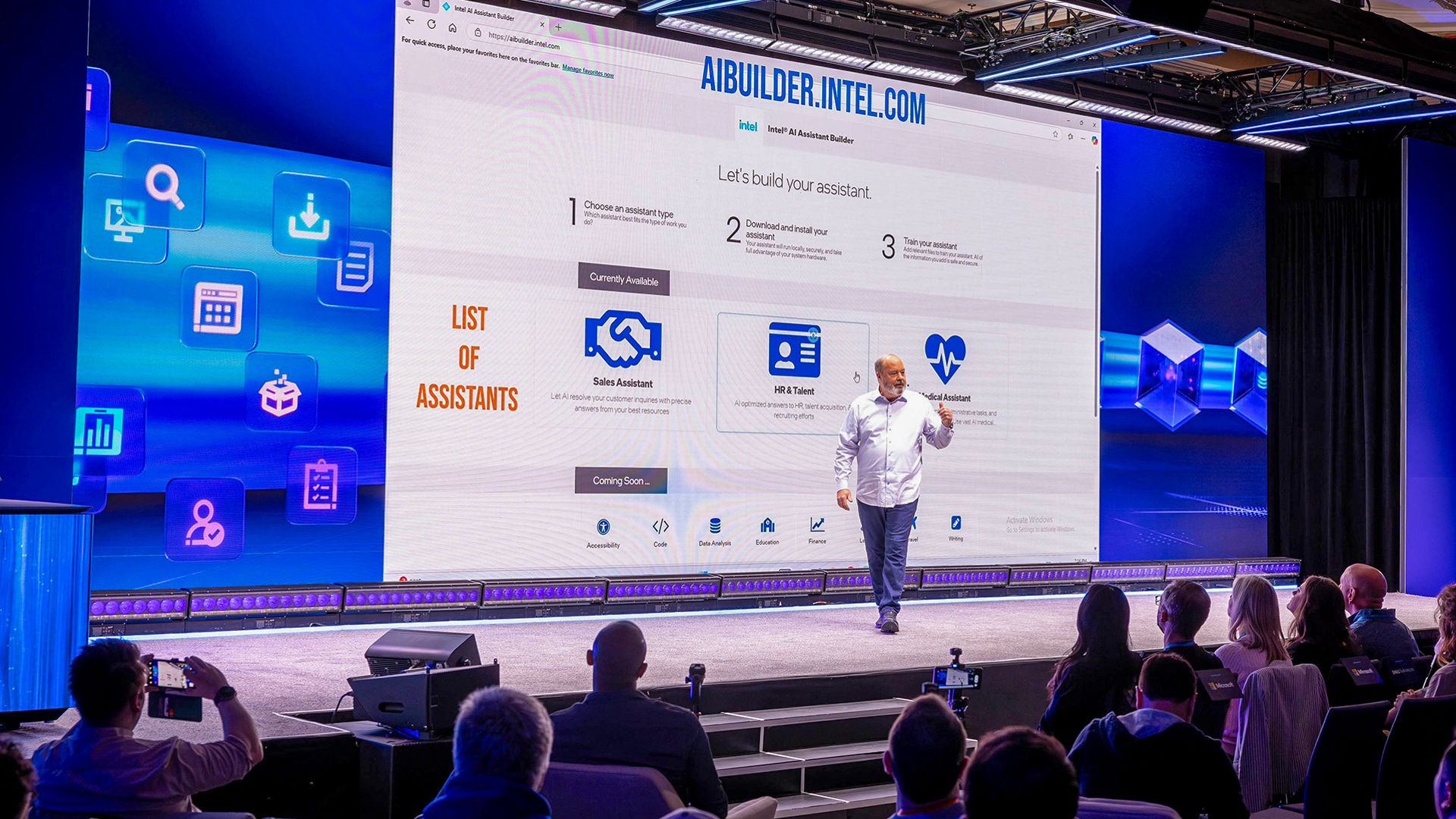 Jim Johnson presents the Intel AI Assistant Builder on stage at CES 2025.