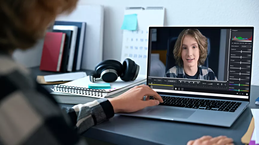 Young boy recording presentation at home for school
