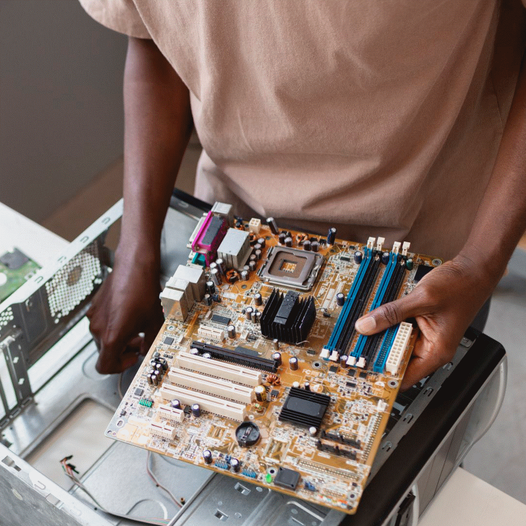 Close Up Man Repairing Computer Chips