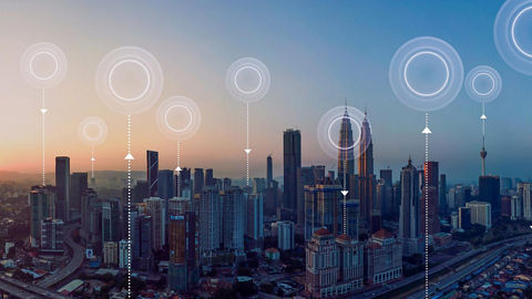 Aerial view of city skyline with network connection concept, sunrise