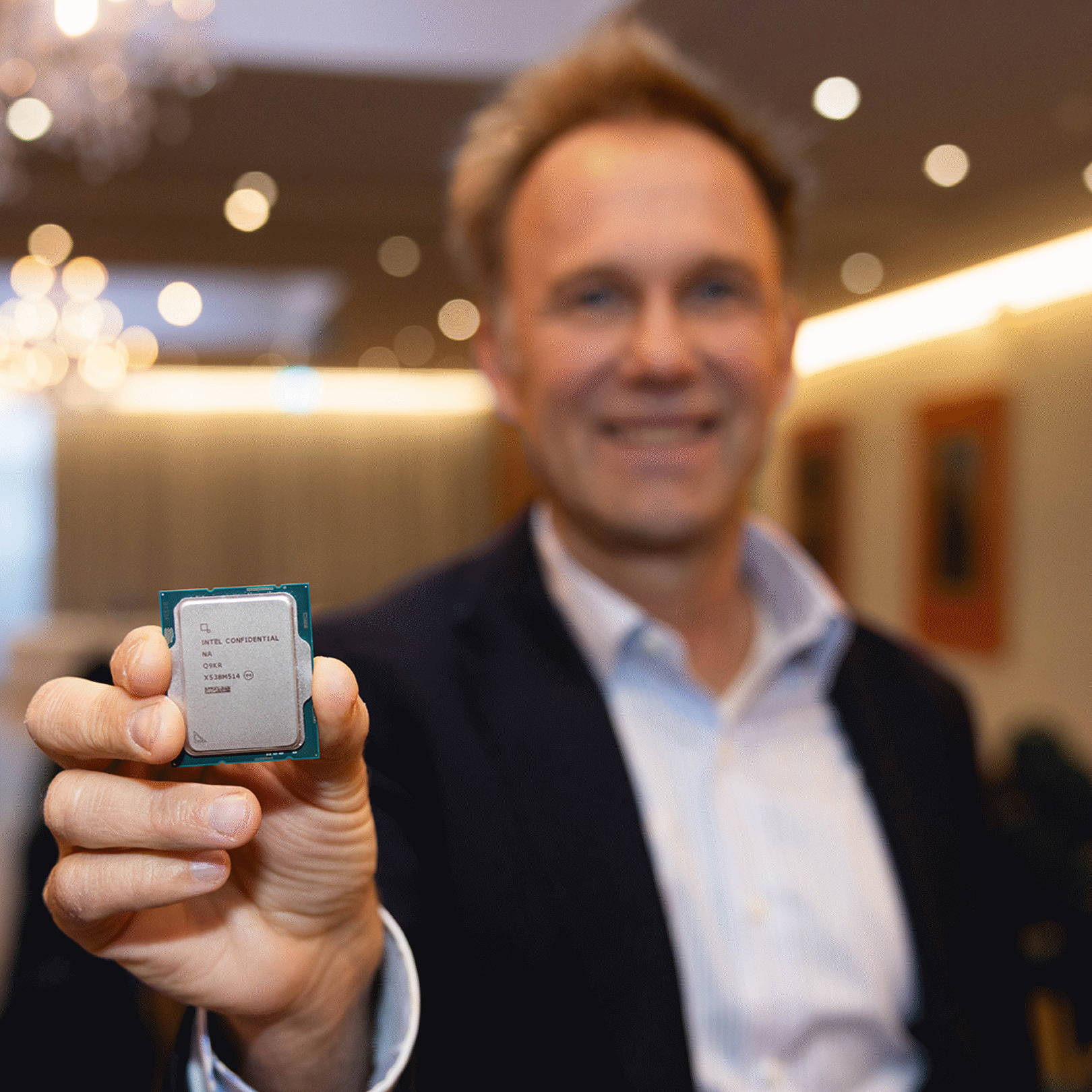 Dan Rodriguez, corporate vice president, Edge Computing Group at Intel, displays an Intel Core Series 2 processor with P-cores at Embedded World 2026 in Nuremberg Germany.