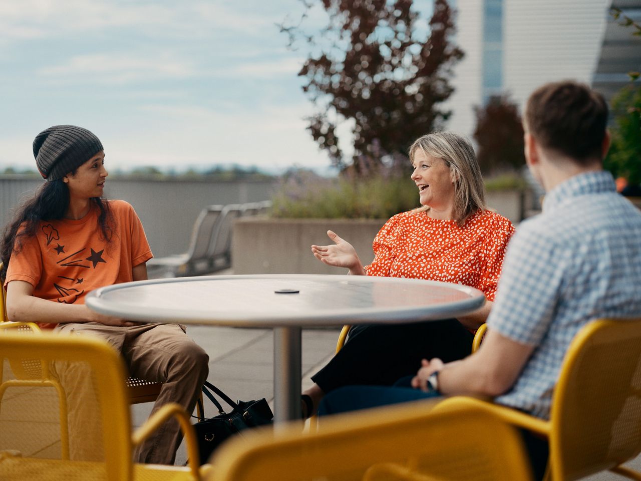 Diverse Group of Employees Chatting Outside