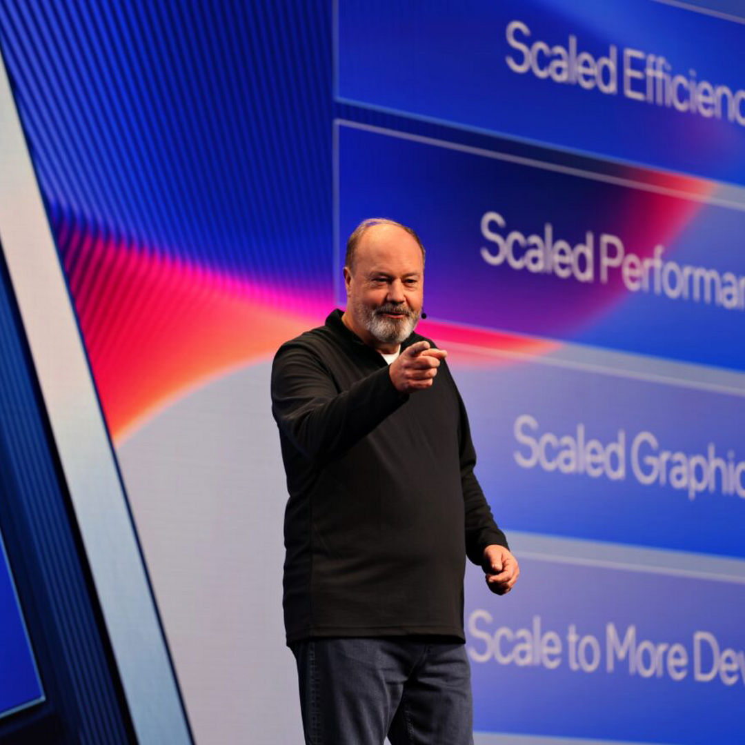 Presenter showing an Intel technology performance slide.