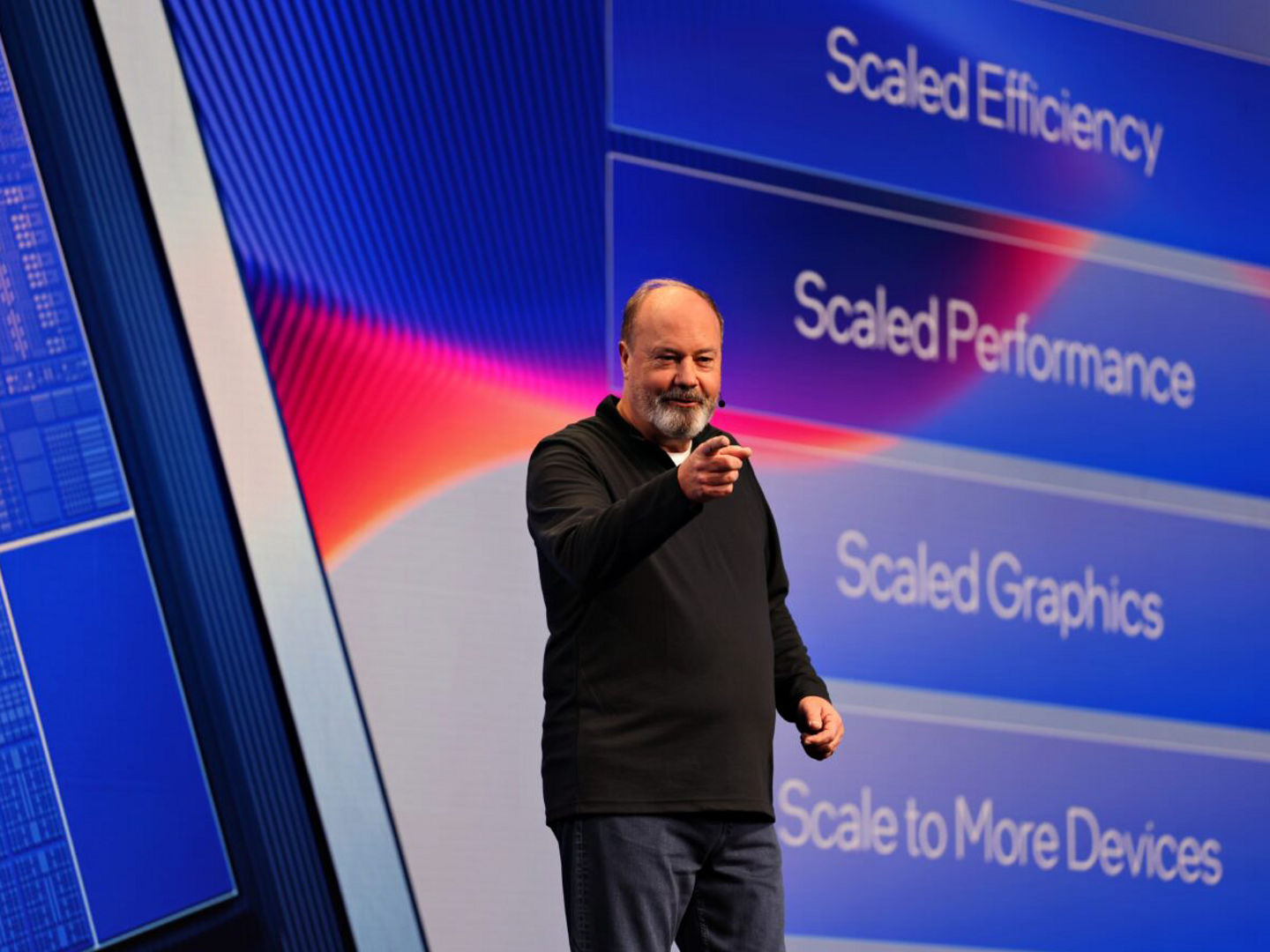 Presenter showing an Intel technology performance slide.