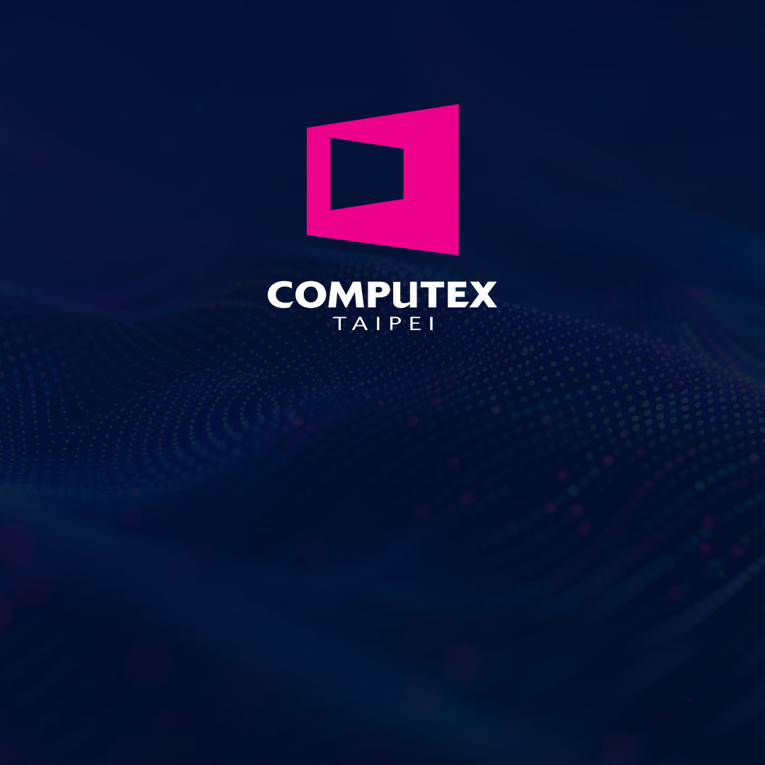 Graphic of pink and white Computex logo overtop of a dark blue background