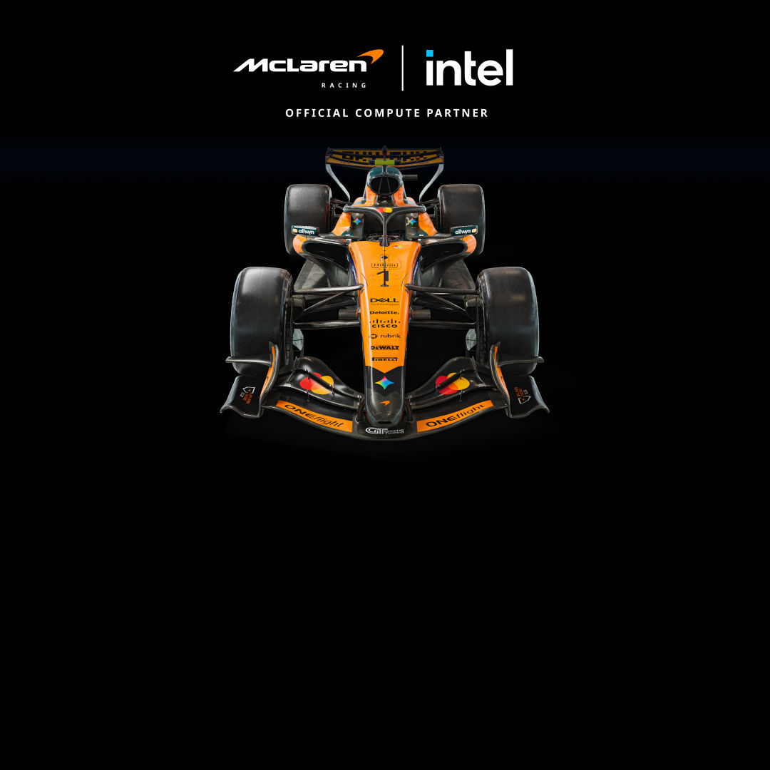 Image of a McLaren yellow F1 racing car on top of a black background