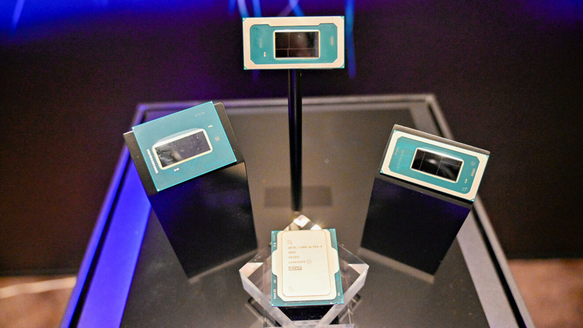 Four Intel processors on display stands at Computex 2025.