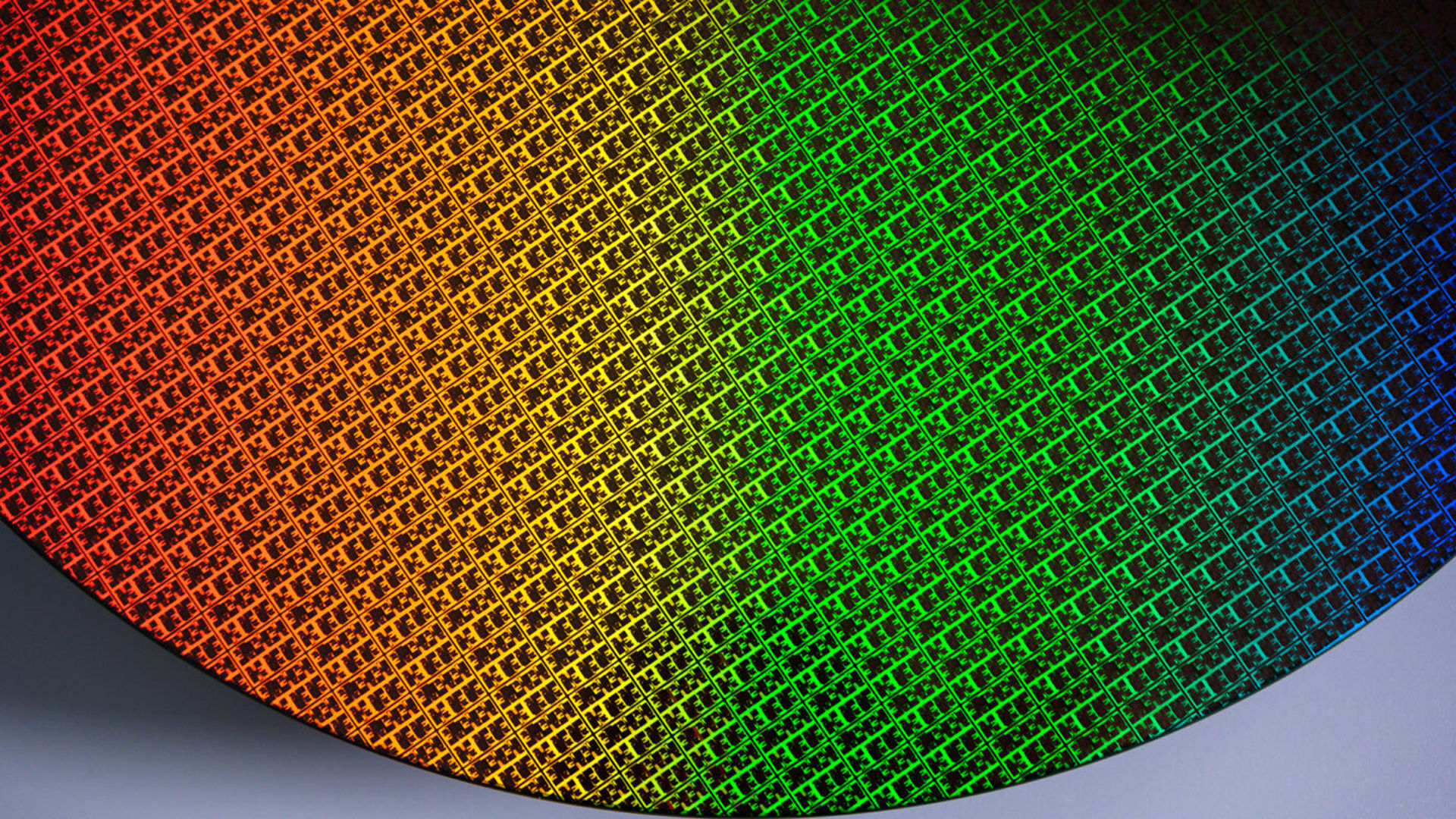 Close-up of an iridescent silicon wafer featuring Intel 18A process technology.