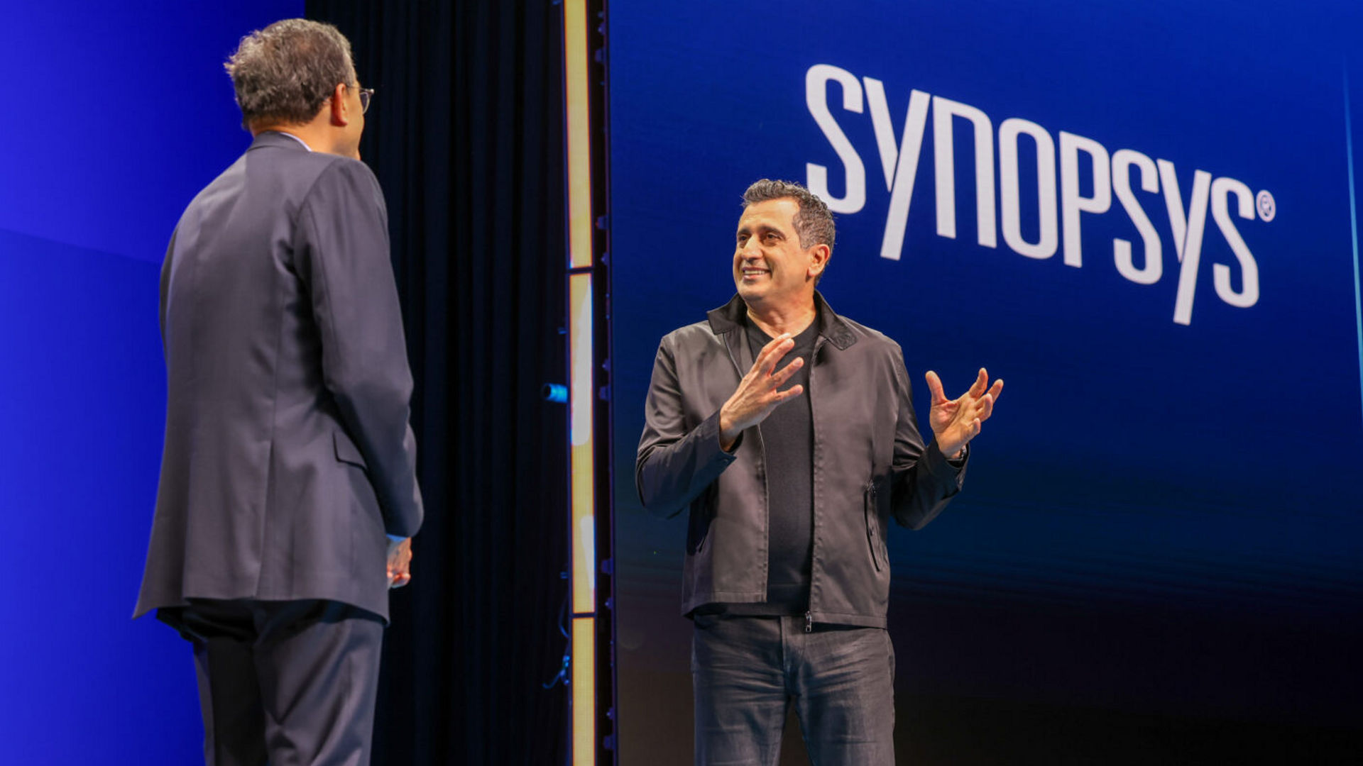 Lip-Bu Tan and Synopsys CEO Sassine Ghazi speak on stage at Intel Foundry Direct Connect.