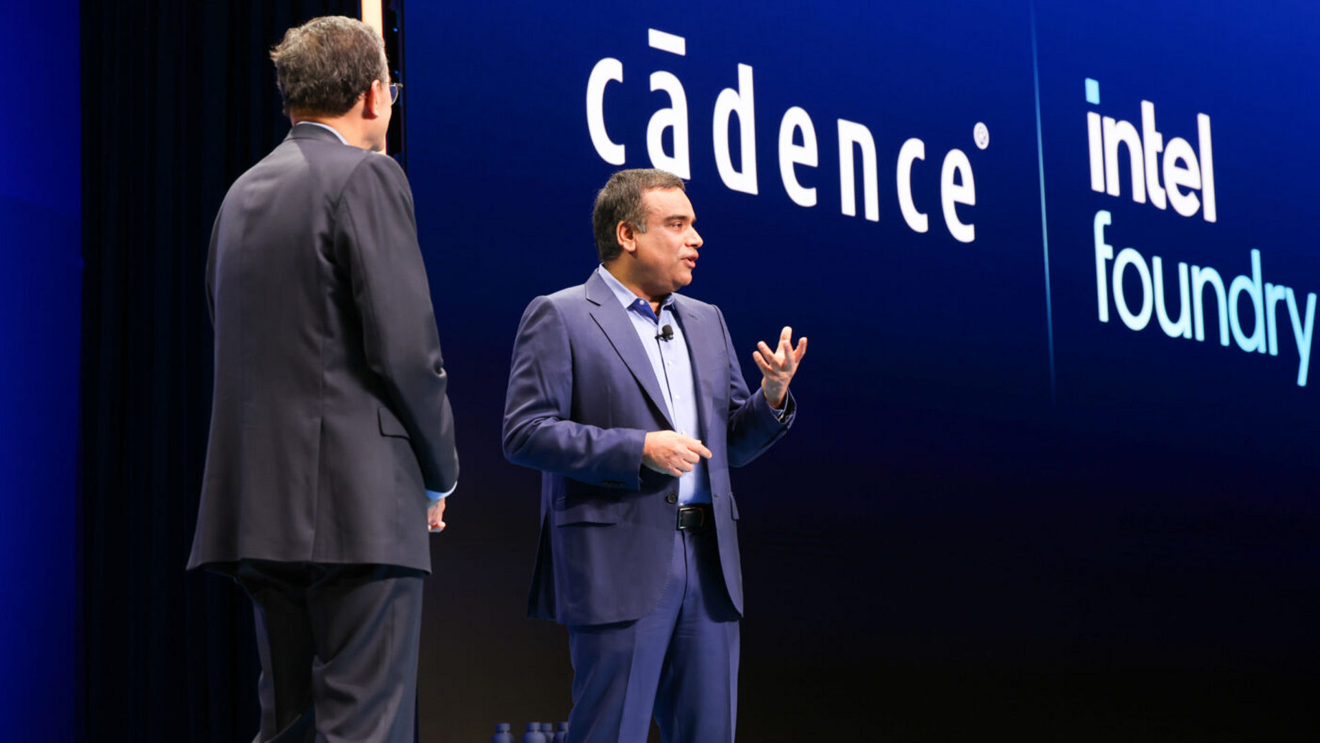 Anirudh Devgan and Lip-Bu Tan speaking on stage at Intel Foundry Direct Connect.