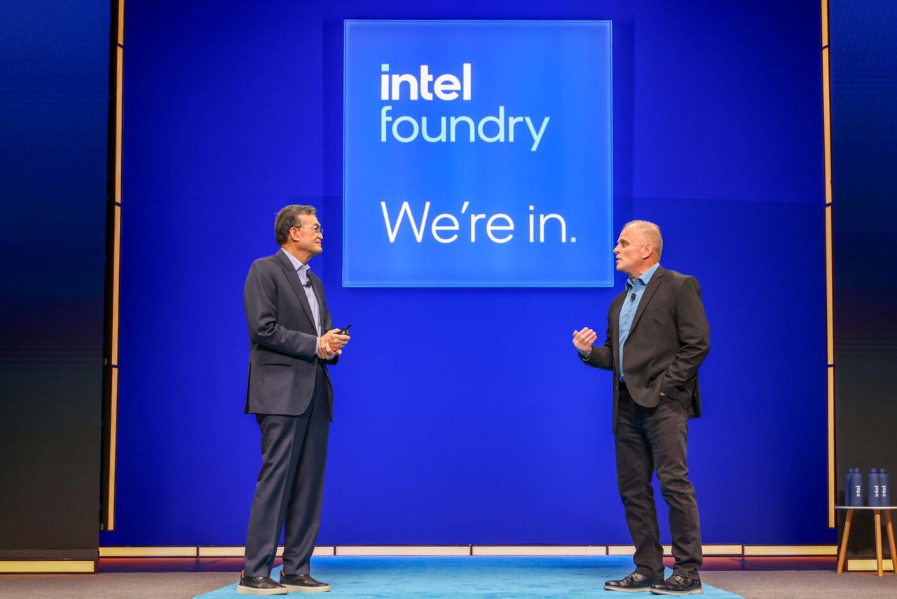 Intel CEO Lip-Bu Tan (left) speaks with Mike Ellow, CEO of Sieme