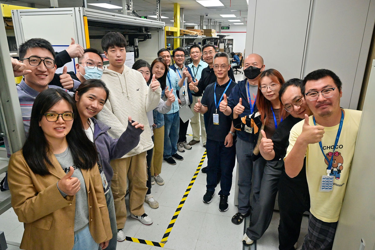 Sam Gao (sixth from right), vice president and general manager of the Client Computing Group at Intel in China, is photographed with the Intel engineering team at the company’s lab in Shanghai, China, in April 2025. (Credit: Intel Corporation)