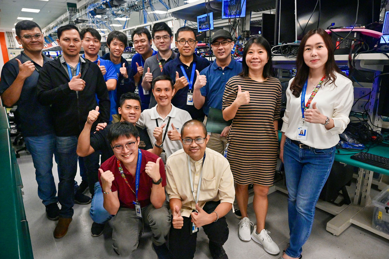 Intel engineers gather for a photo at the company’s Client Computing Group Mega Lab in Penang, Malaysia, in April 2025. (Credit: Intel Corporation)