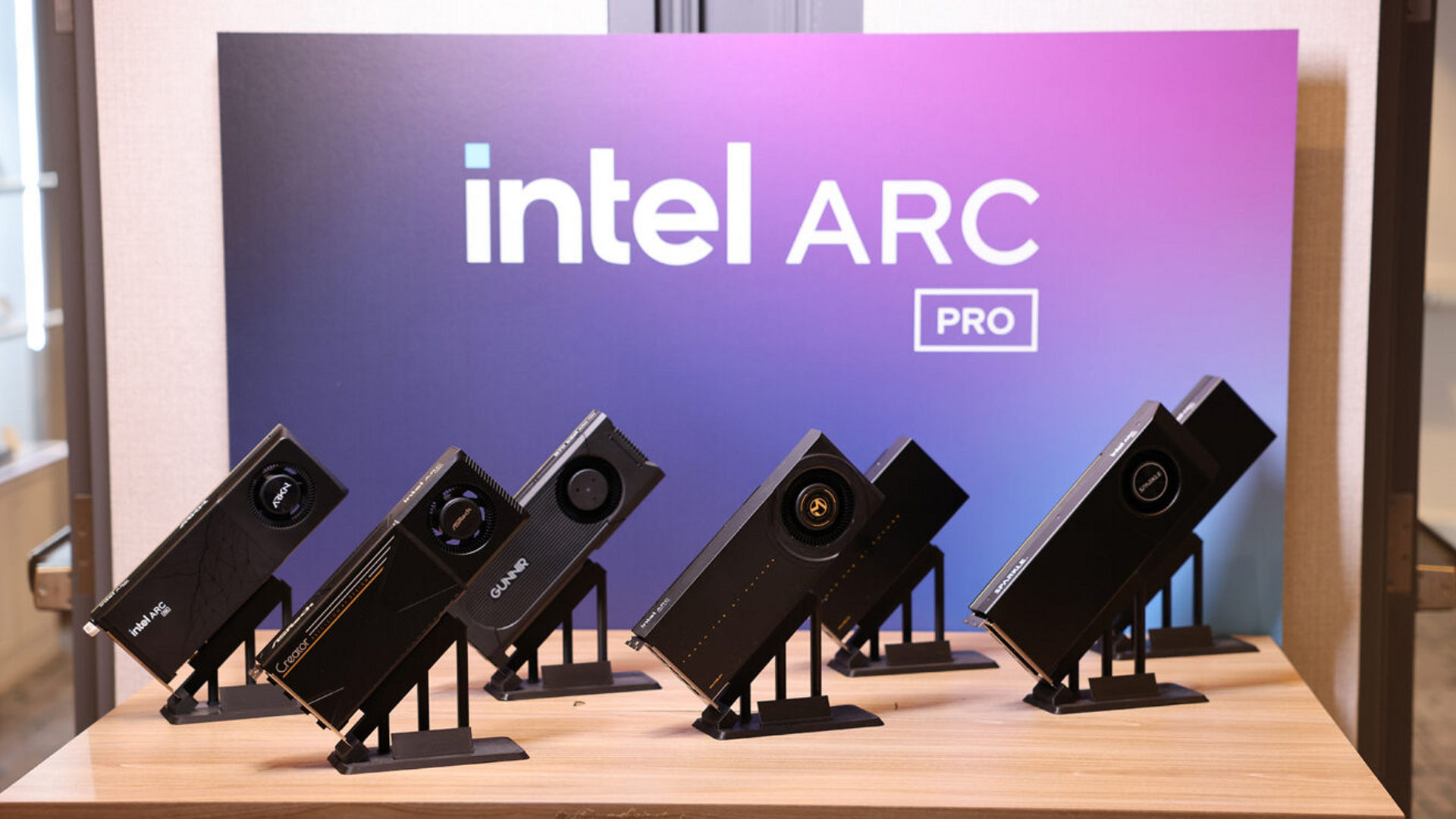 Intel displays the Intel Arc Pro B65 and B70 discrete GPUs from partners, which expand Intel's professional graphics portfolio by delivering strong performance and value for content creation, engineering workloads, and AI inference applications. (Credit: Intel Corporation)
