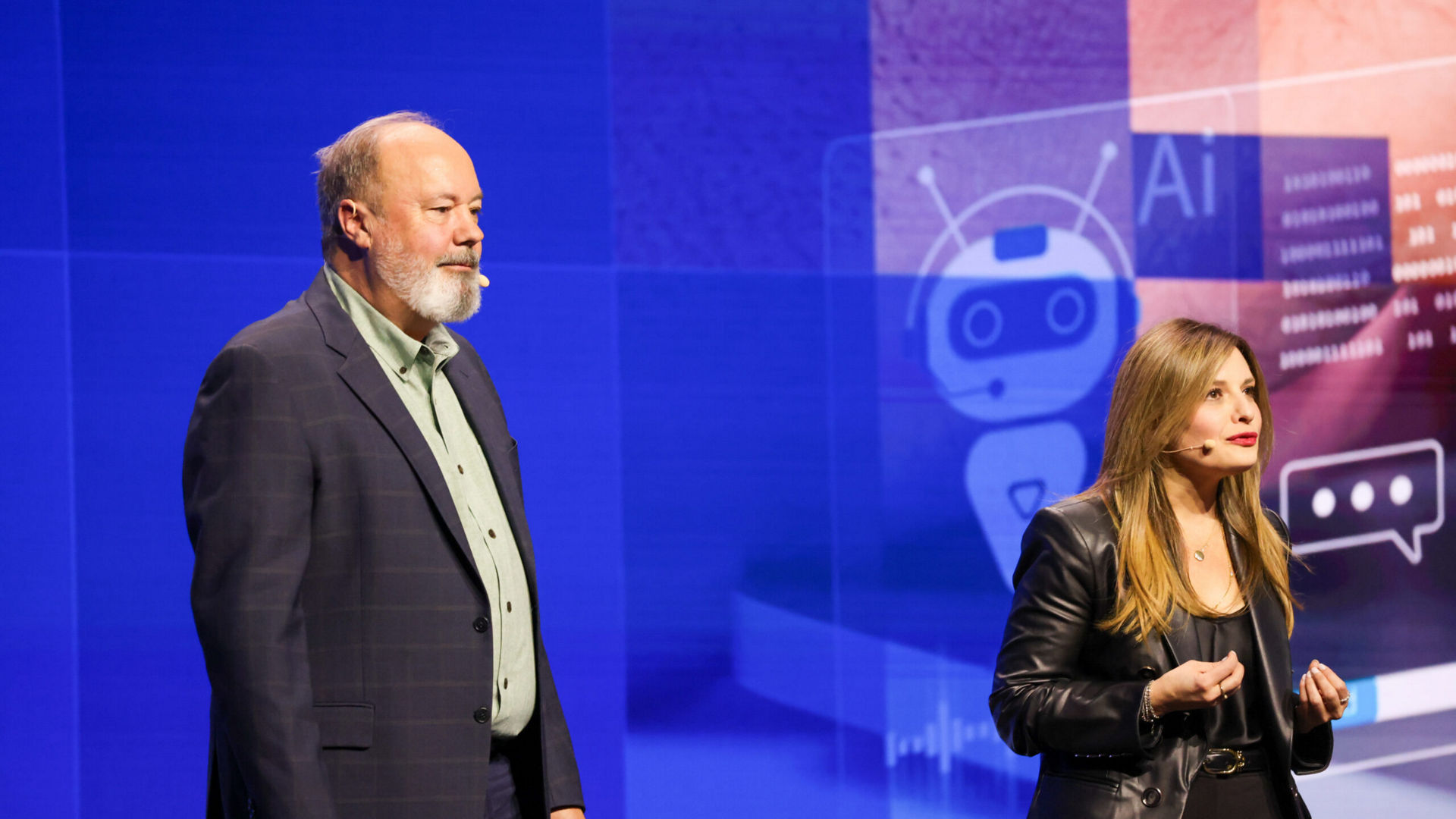 Dounia Senawi (right), Deloitte Consulting’s chief commercial officer, appears on stage with Jim Johnson, general manager of the Client Computing Group at Intel, during the Intel Vision event on Tuesday, April 1, 2025, in Las Vegas. Senawi discussed Deloitte’s strategic investment in a fleet of Intel Core Ultra AI PCs for its developers, and she reported the company has seen a 50% time savings in completing routine tasks. (Credit: Intel Corporation)