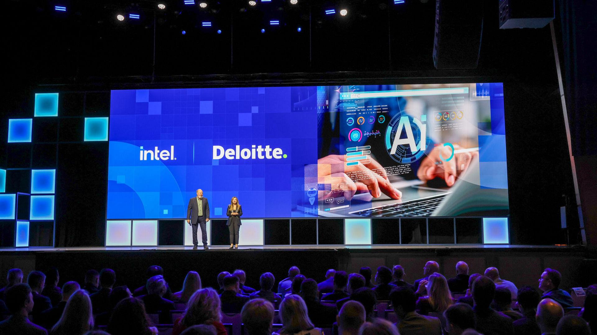 Dounia Senawi (right), Deloitte Consulting’s chief commercial officer, appears on stage with Jim Johnson, general manager of the Client Computing Group at Intel, during the Intel Vision event on Tuesday, April 1, 2025, in Las Vegas. Senawi discussed Deloitte’s strategic investment in a fleet of Intel Core Ultra AI PCs for its developers, and she reported the company has seen a 50% time savings in completing routine tasks. (Credit: Intel Corporation)