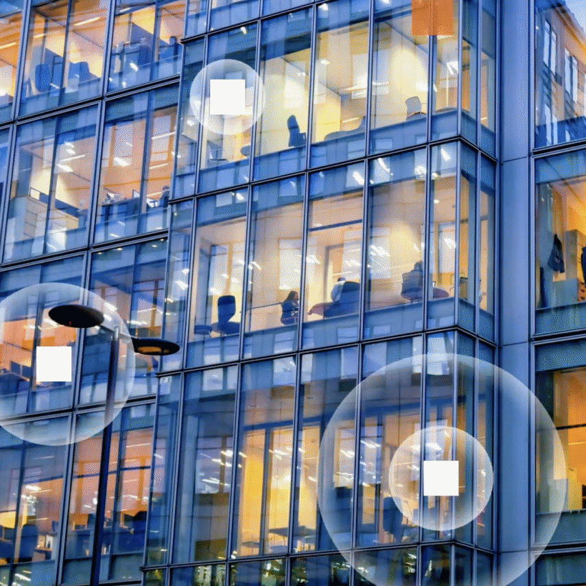 Glass office building with circle graphics