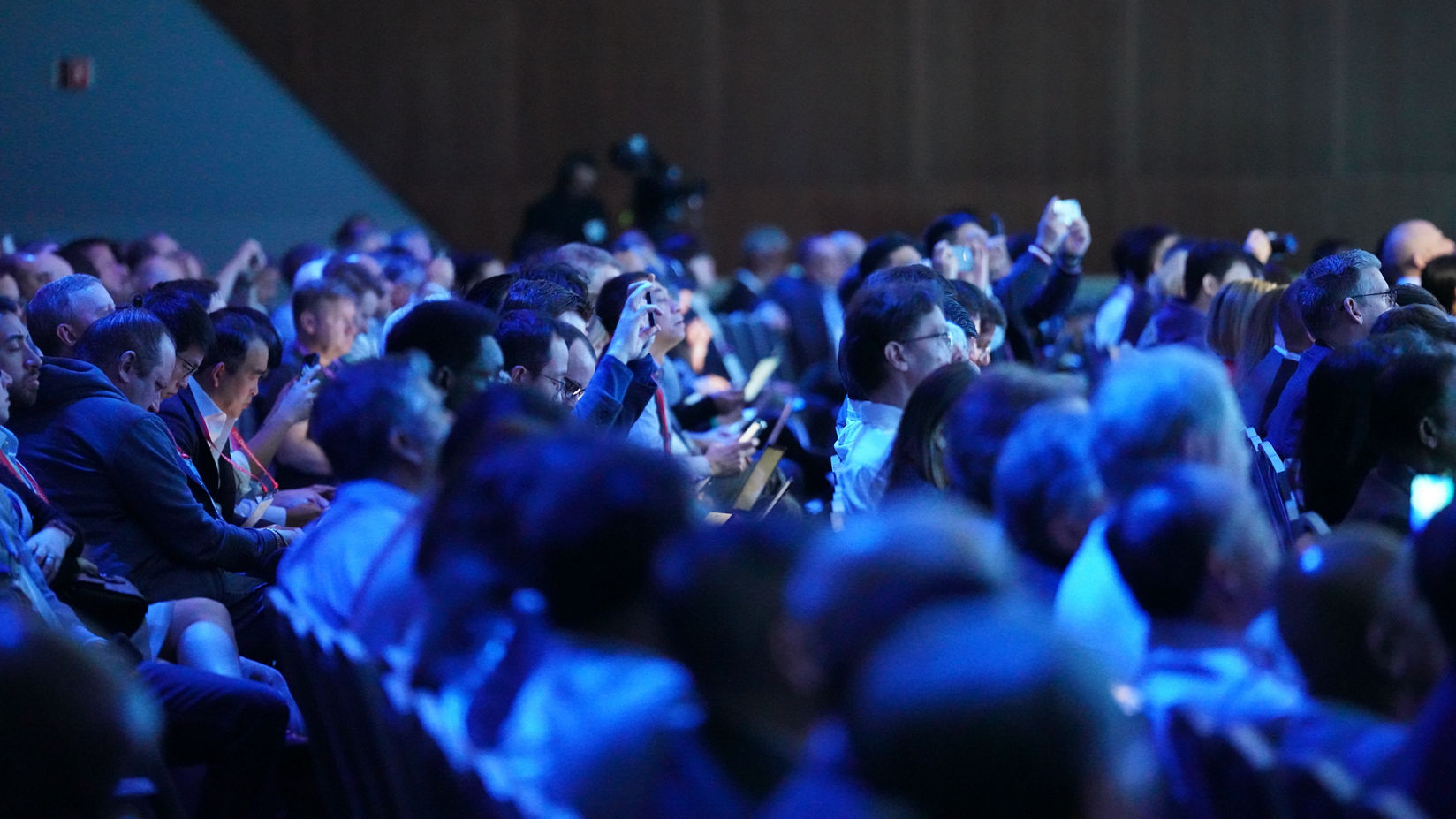 Photograph of the audience viewing keynote content at Intel Foundry Direct Connect 2025.