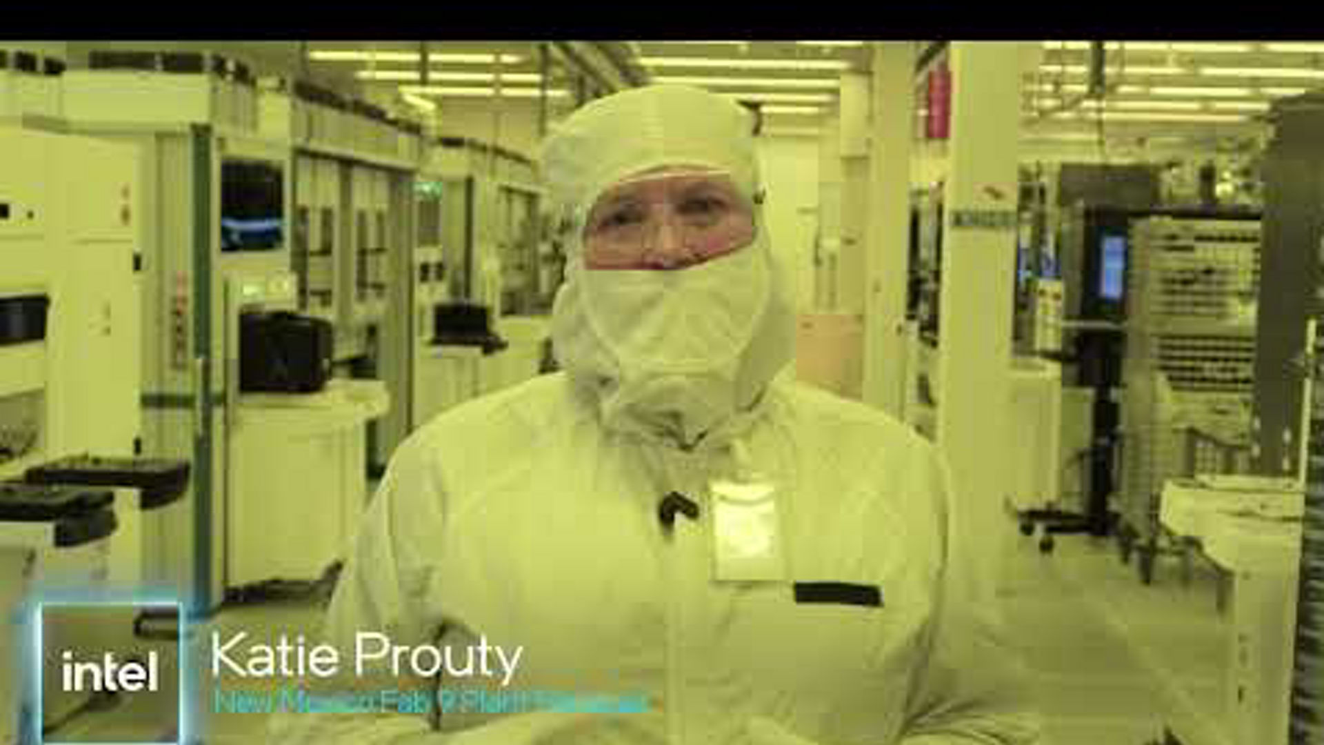 Katie Prouty, Intel Fab 9 plant manager, in a cleanroom suit at a semiconductor manufacturing facility.