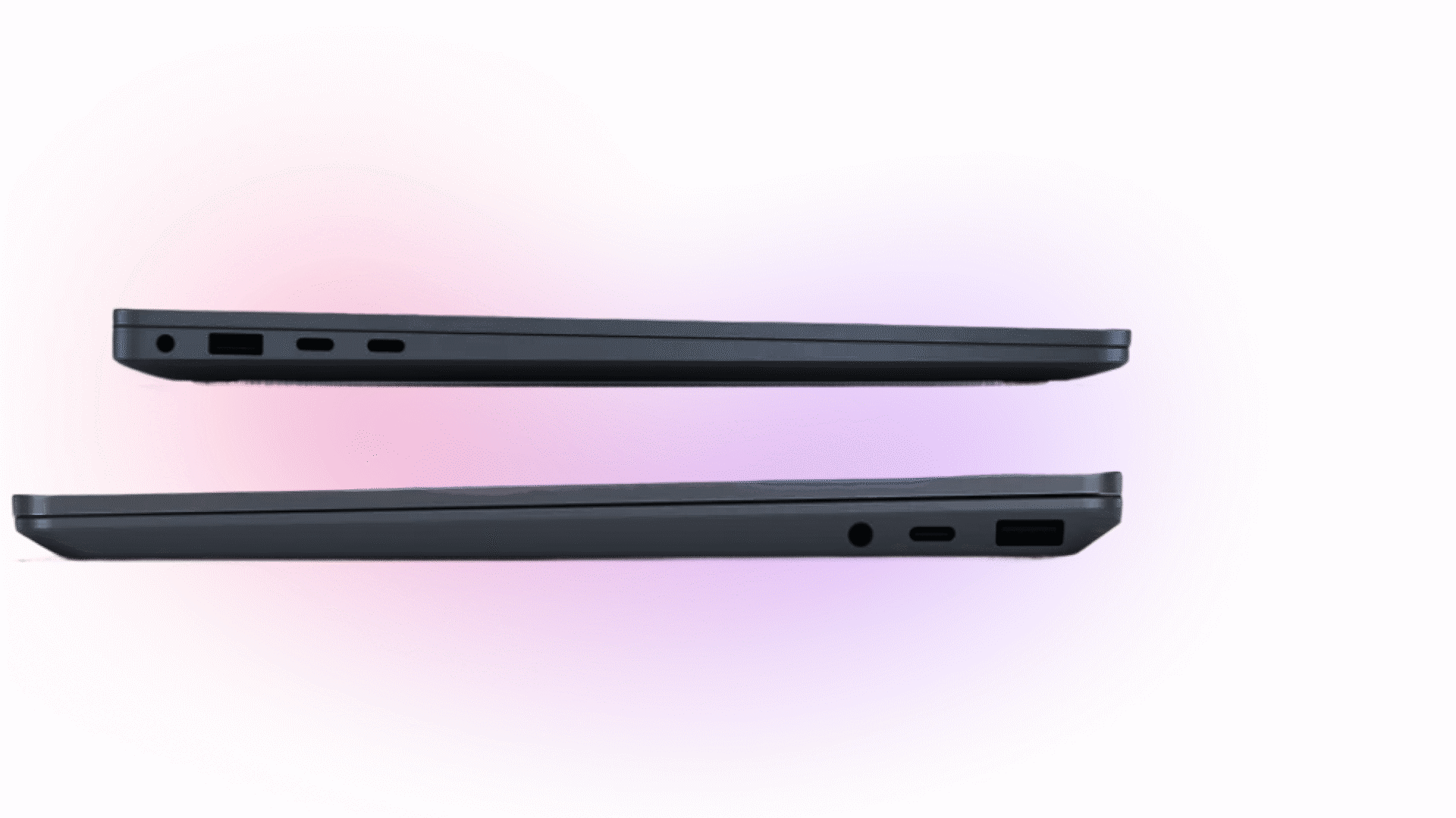 Side view of two closed thin laptops