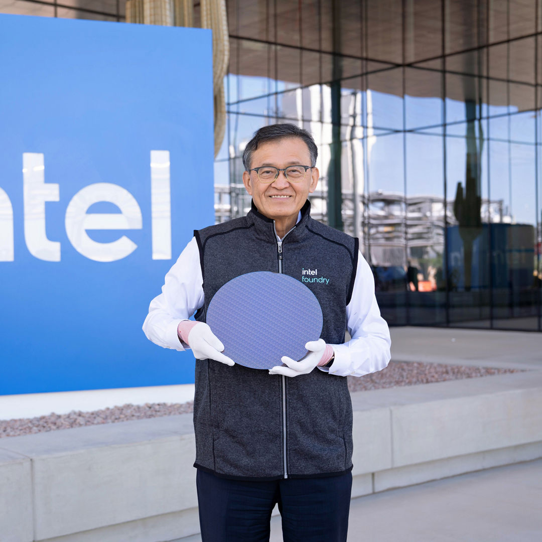 Lip-Bu Tan holds a Panther Lake wafer at Intel’s Ocotillo campus.