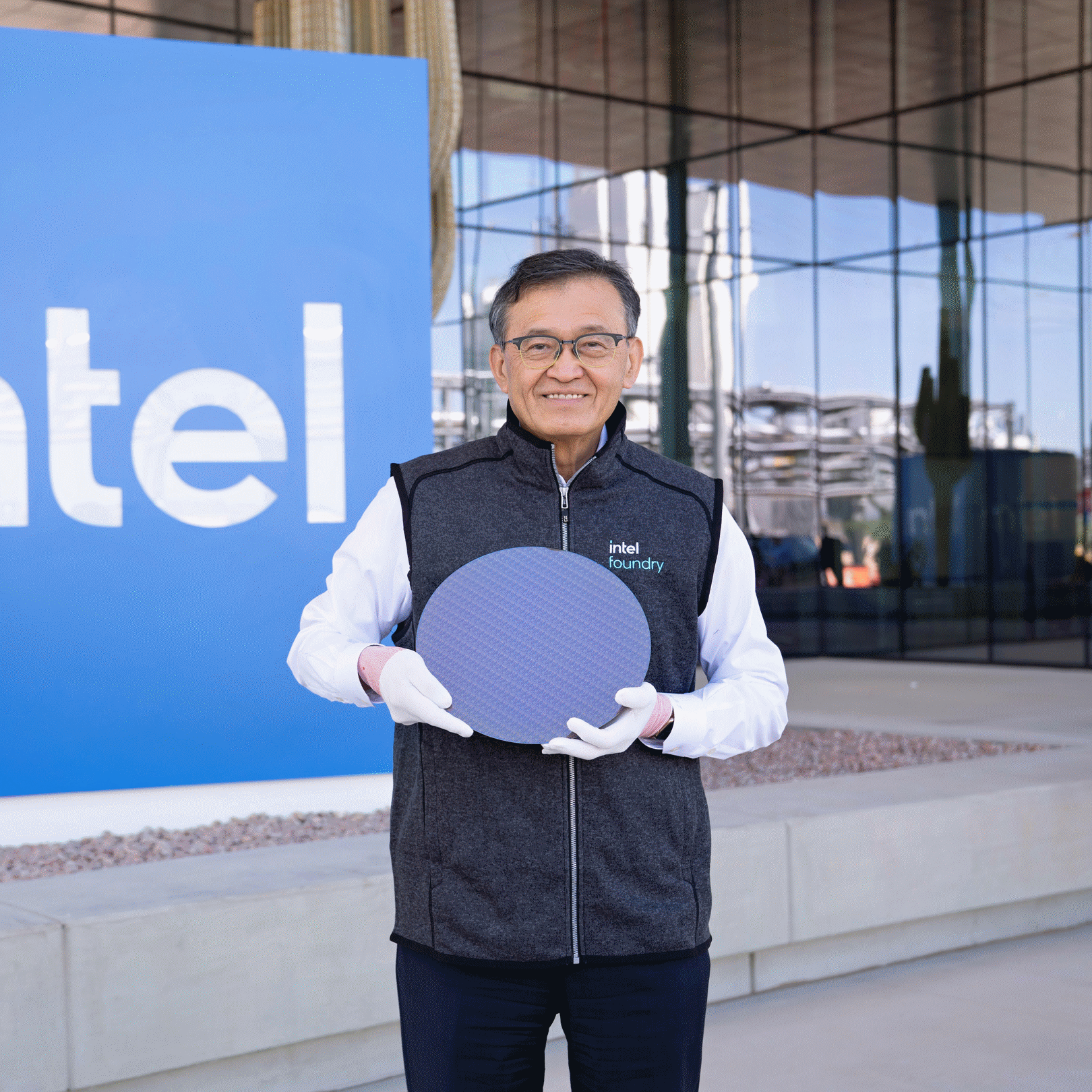 Intel CEO Lip-Bu Tan holds a wafer of CPU tiles for the Intel Core Ultra series 3, code-named Panther Lake, at the Intel Ocotillo campus in Chandler, Arizona. Panther Lake is the first client system-on-chips (SoC) built on the Intel 18A process node. (Credit: Intel Corporation)