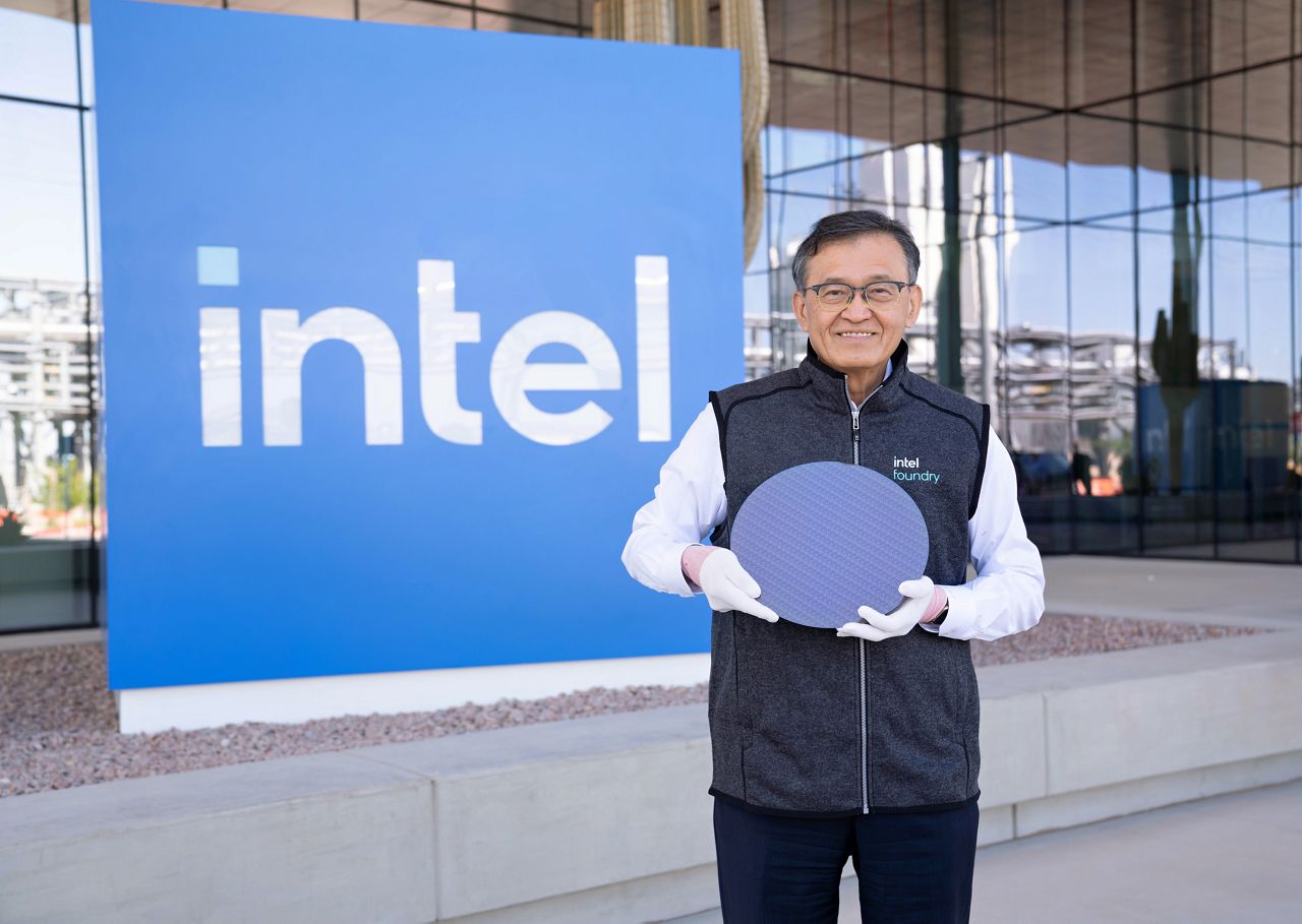 Lip-Bu Tan holds a Panther Lake wafer at Intel’s Ocotillo campus.