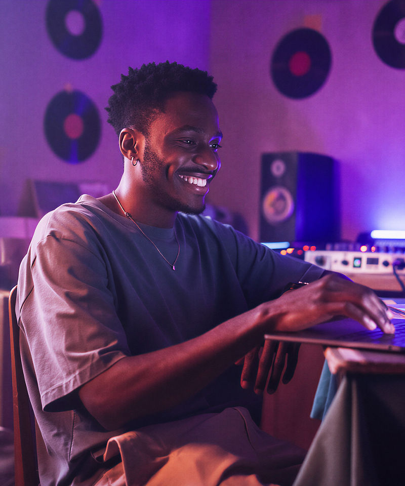 Person using laptop at home (Intel official image)