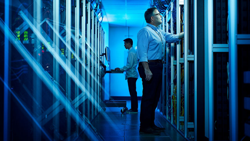 Men in server room
