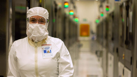 woman technician in a bunny suit