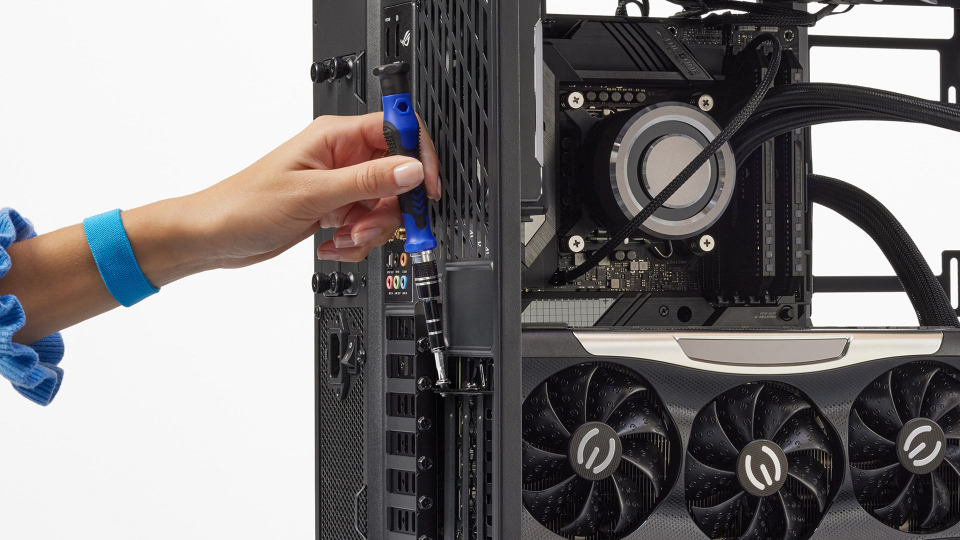 Photo of installing GPU with screwdriver