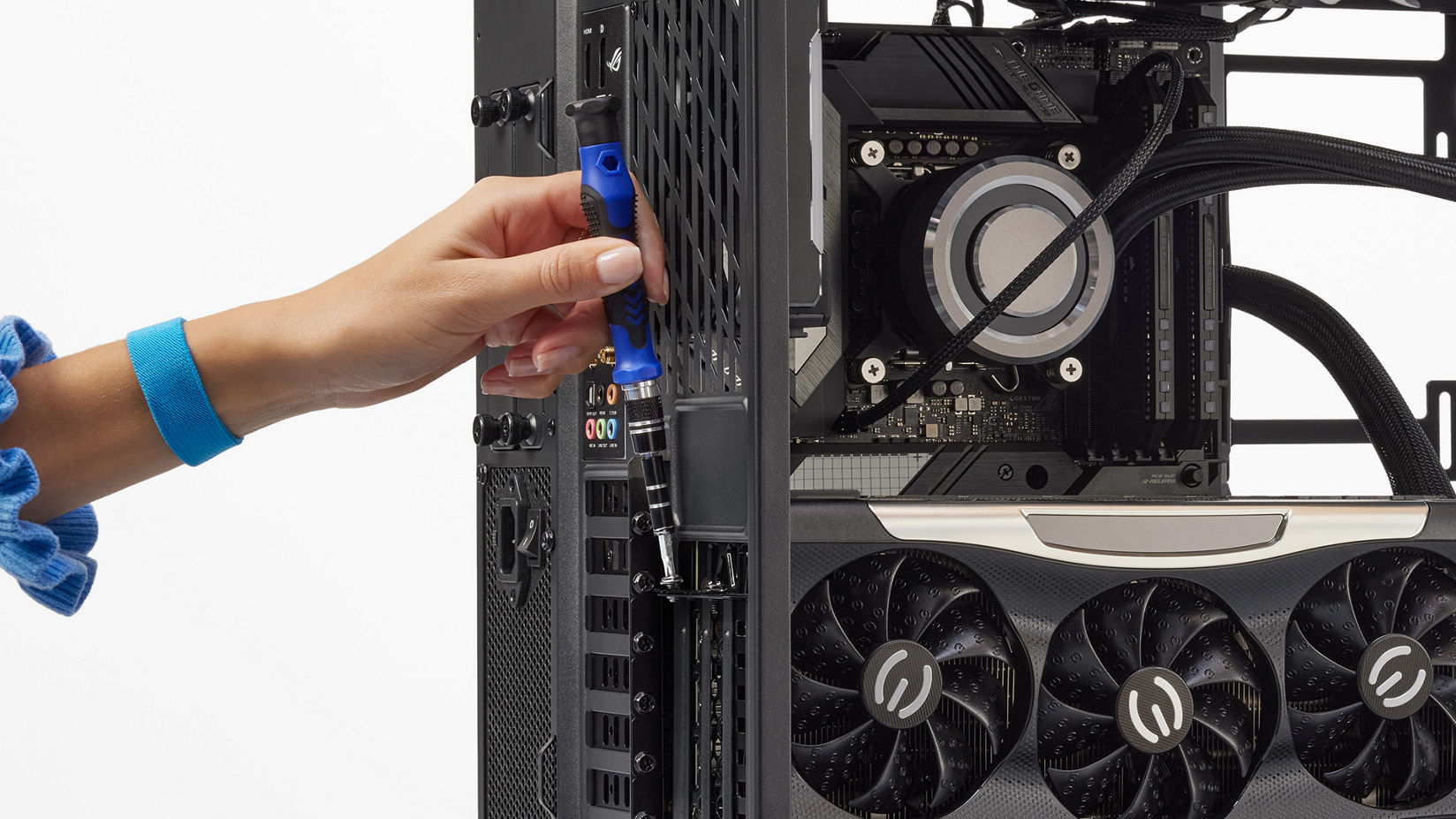 Photo of installing GPU with screwdriver