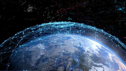 View of Earth from space with illustrated network connections surrounding the planet