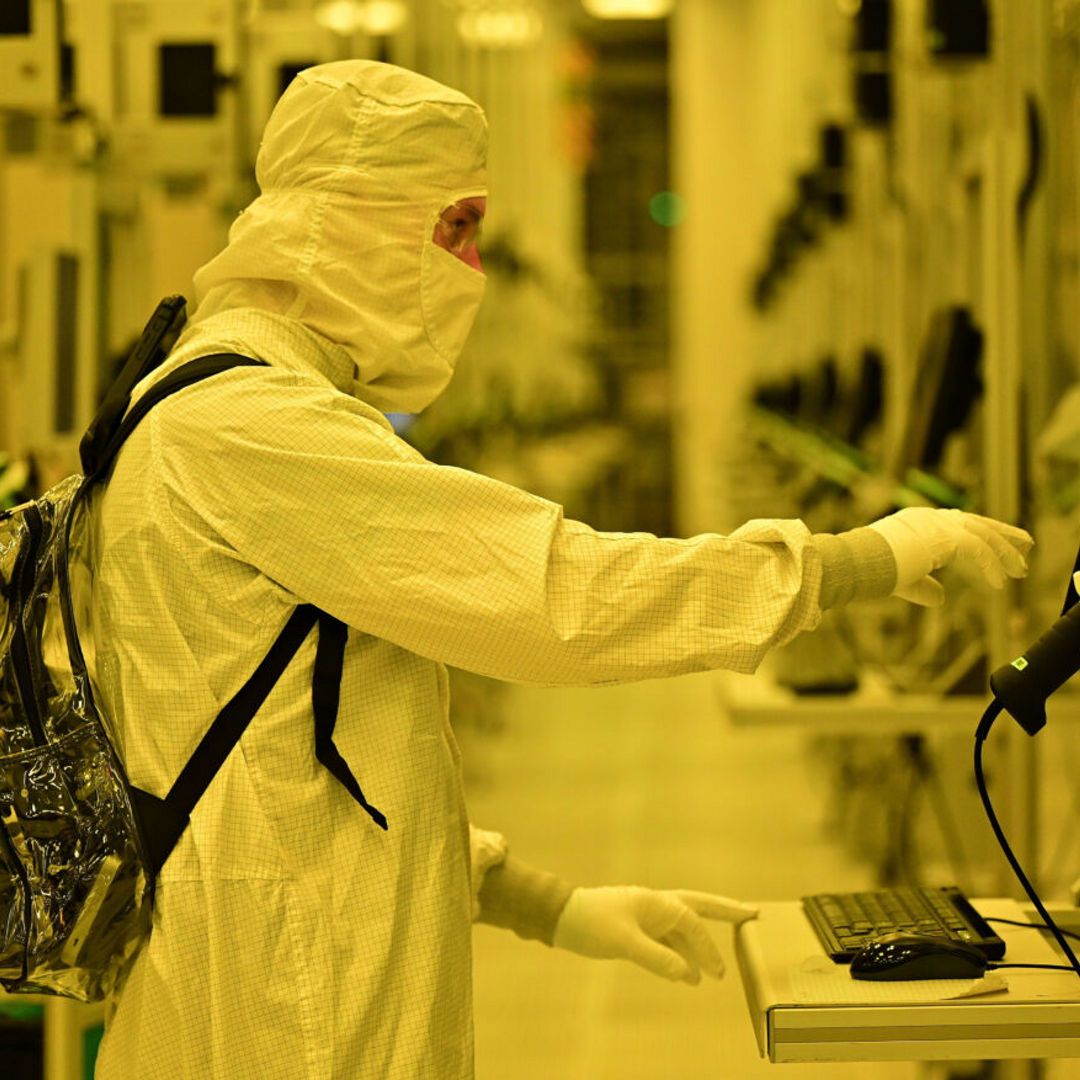 An Intel manufacturing technician inside the new Fab 52 in Chandler, Arizona, in September 2025.