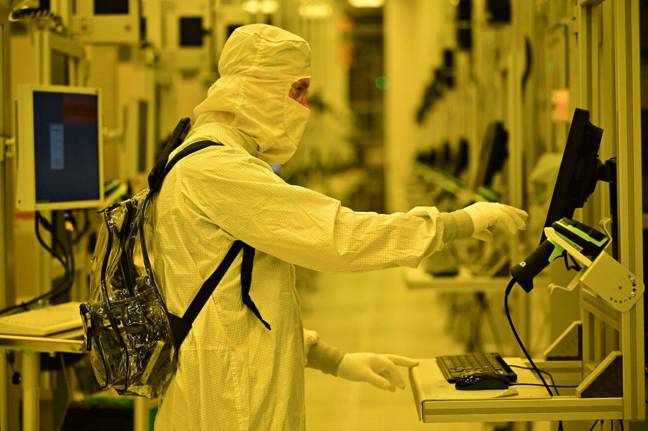 An Intel manufacturing technician inside the new Fab 52 in Chandler, Arizona, in September 2025.